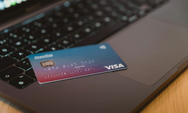 What Are Some Of The Common Marketing Tactics Credit Card Companies Use To Market To Young Adults?